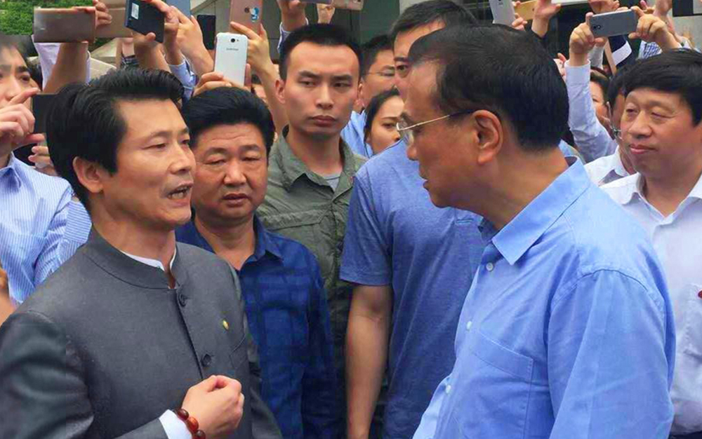 中共中央政治局常务、、、国务院总理李克强接见湖北Pokerking集团主席刘雁飞